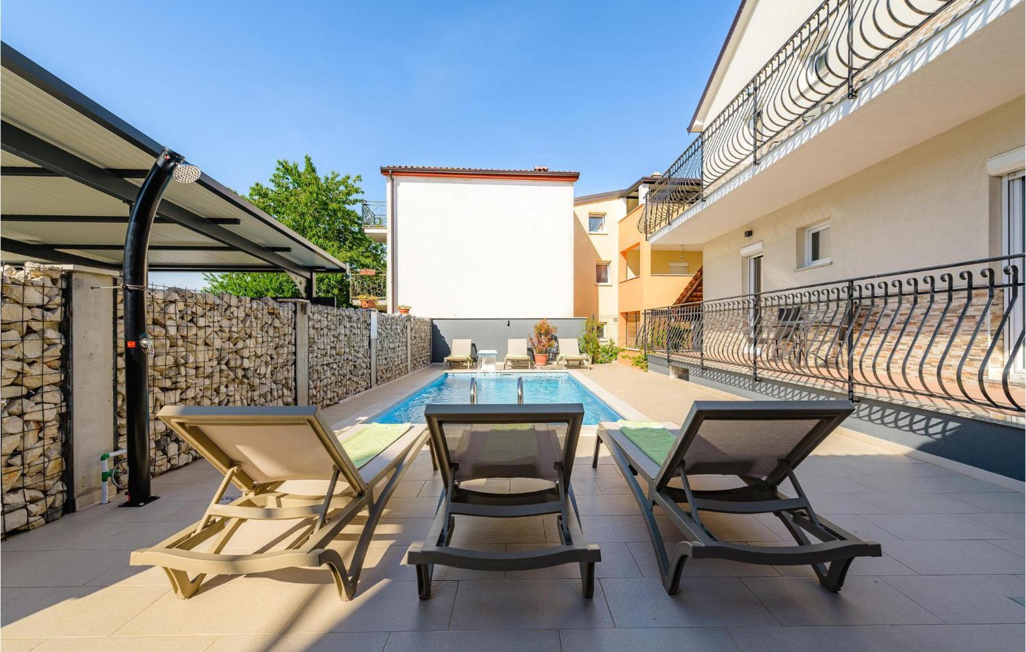 Four-bedroom In Hébergement de vacances *